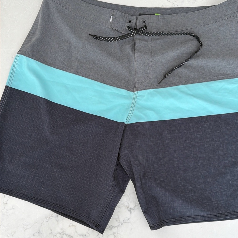 Quicksilver Men’s board shorts, size 38, never worn